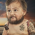 Baby with a pipe sporting a beard